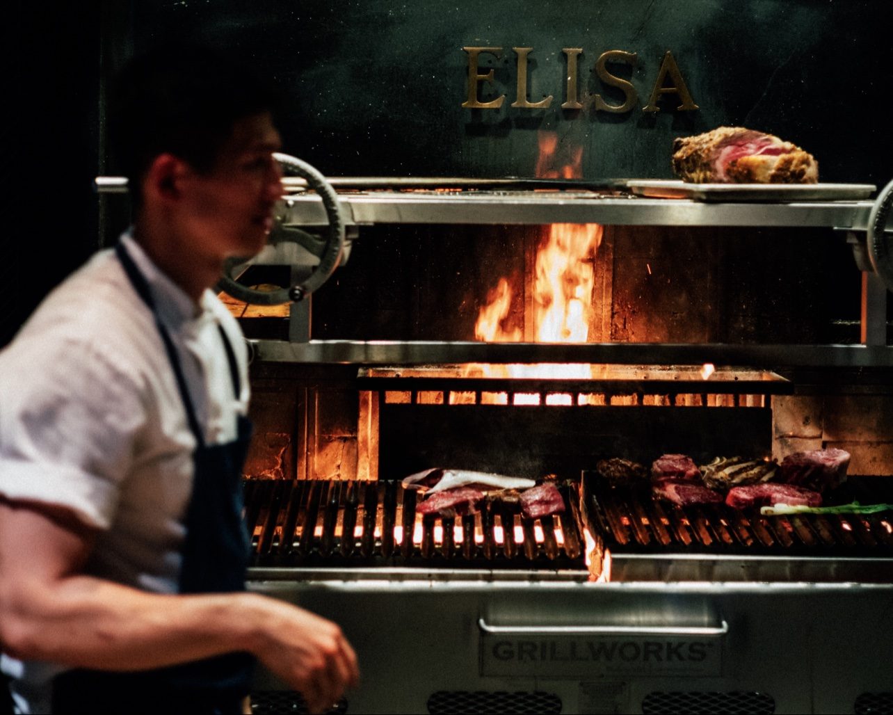 Chef working the Elisa grill