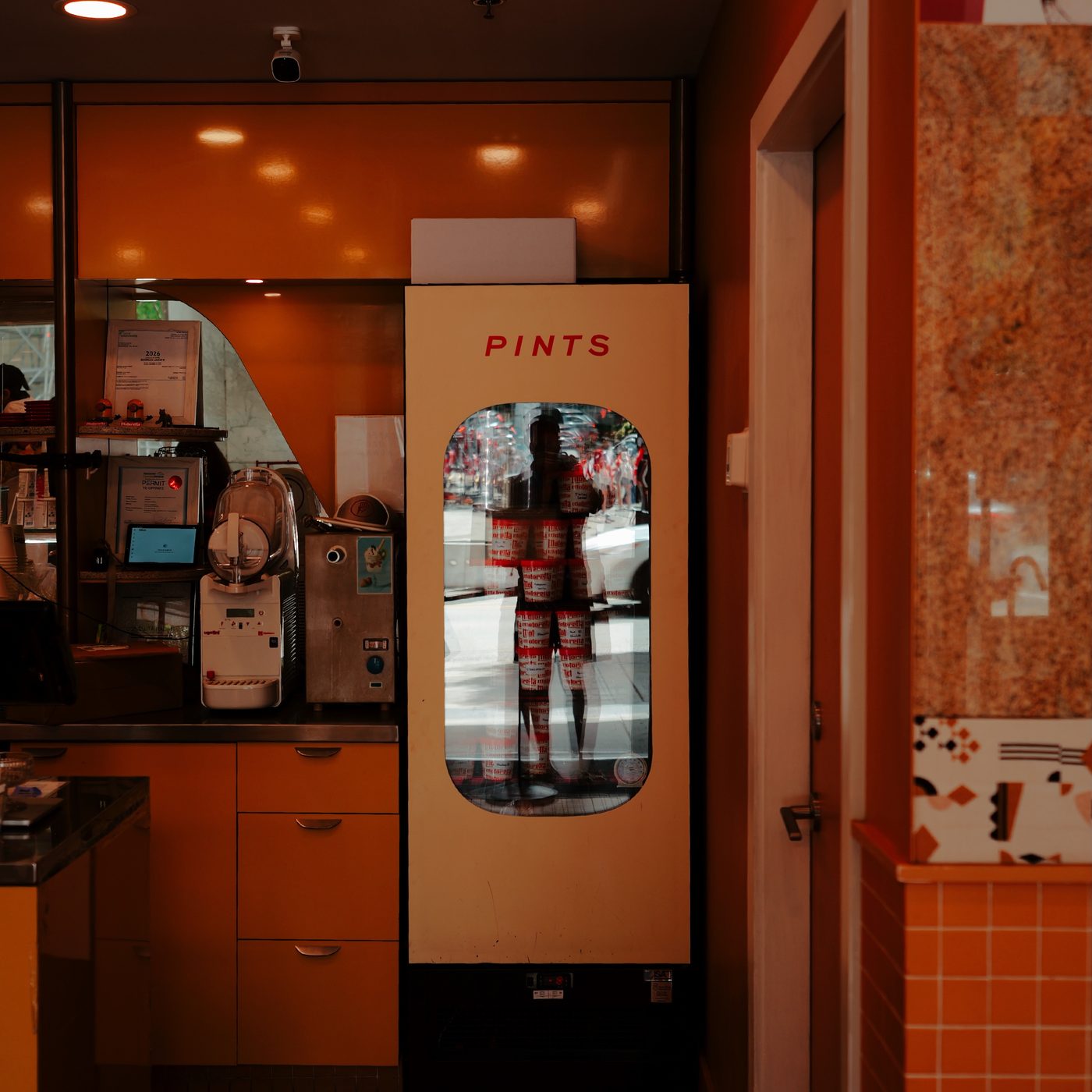 Cafe interior with pints fridge
